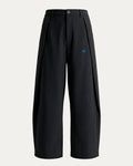 PCES Black Cocoon pants with a small lettering logo